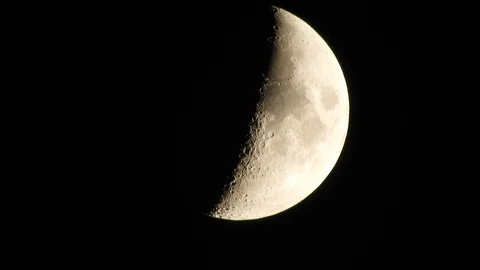 4k Moon in cloudy night sky close up video Stock Footage 93928202