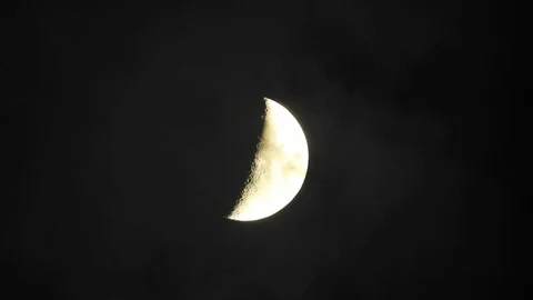 4k Moon in cloudy night sky close up video Stock Footage 93928233