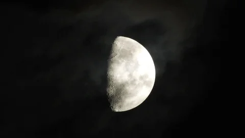 4k Moon in cloudy night sky close up video Stock Footage 93928362