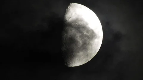 4k Moon in cloudy night sky close up video Stock Footage 93928421