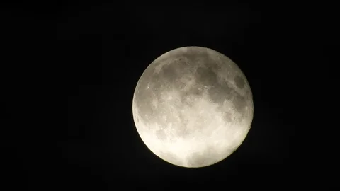 4k Moon in cloudy night sky close up video Stock Footage 93928801