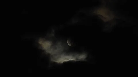 4k Moon in cloudy night sky close up video Stock Footage 93928921