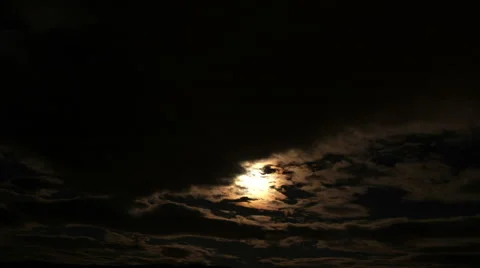 4k Moon Nighttime Time Lapse: Clouds passing by subsequently eclipsing the moon Stock-Footage 58006258