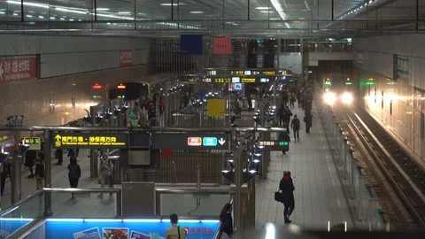 4k Motion of commuters walking and taking MRT Stock Footage 104247199
