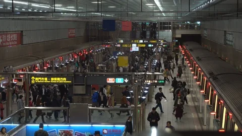 4k Motion of commuters walking and taking MRT Stock Footage 104247206