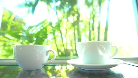 4K  motion hand of men using spoon to mix the coffee in the white cup. Stock Footage 121191591