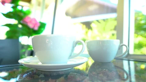 4K  motion hand of men using spoon to mix the coffee in the white cup. Stock Footage 121191604
