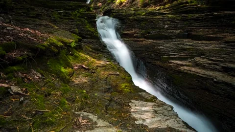 4K Motion Timelapse of Chute Waterfall and Narrow Shale Gully Stock Footage 244492160