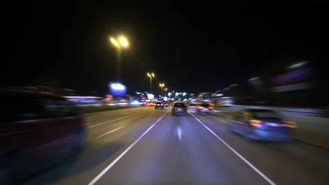 4K - Motion timelapse of driving a car in a big city at night Stock Footage 167309477