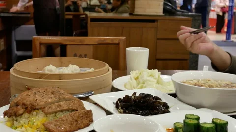 A 4K Motion View of Dining at a Chinese Restaurant Video stock 236635511
