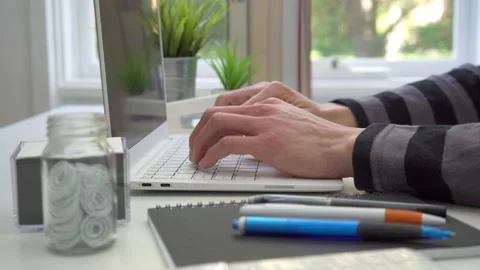 4k motorized jib shot of using laptop computer Stock Footage 133989670