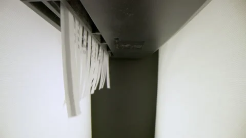 4k motorized macro moving shot of shredding documents using paper shredder Stock Footage