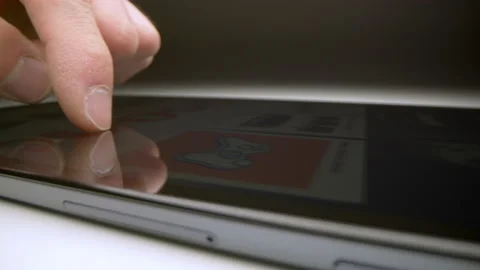 4k motorized orbit shot of browsing the Amazon online store on a tablet Video stock 133542970