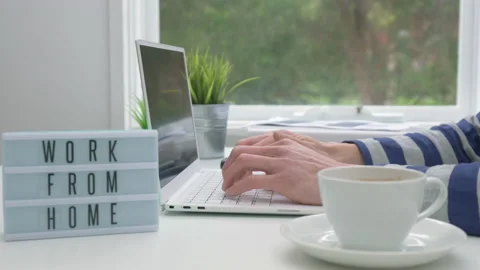 4k motorized orbit shot of working from home Stock Footage 132783404