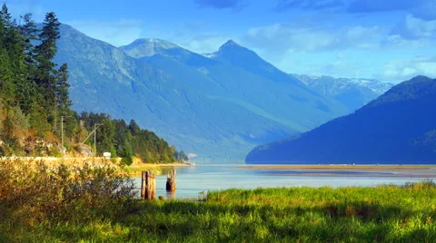 4K Mountain and River Plain Landscape, Low Setting Sun, Blue and Green Stock Footage 66689991