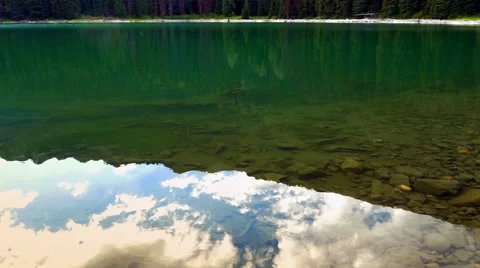 4K Mountain Lake Reflection, Clouds at Dusk Setting Sunlight Stock Footage 67224838