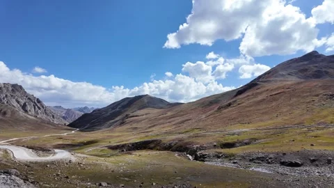 4K Mountain Landscape Cinematic Side View of Lush Green Mountains with Majes Stock Footage 288003293