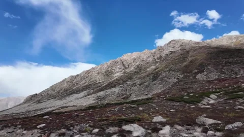 4K Mountain Majesty Side View of a Scenic Bitumen Road Winding Through Lush  Video stock 288325087
