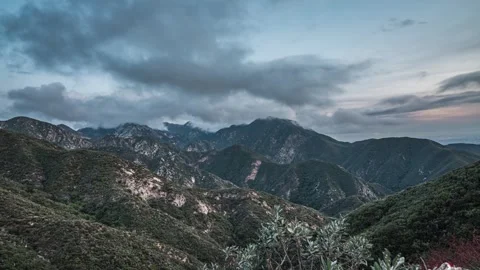 4K Mountain Timelapse of Clouds Moving through Sky with Beautiful Colors Stock Footage 272207126