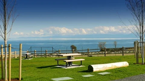 4K Mountain View and Ocean From Park, Picnic Bench and Green Grass Urban Park Stock Footage 83252504