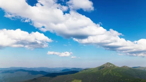 4K. Mountains with clouds and blue sky.Without birds, time lapse Stockbeeldmateriaal 79755902