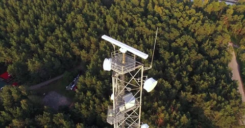 4K - Movement around a telecommunications tower Stock Footage 69028762