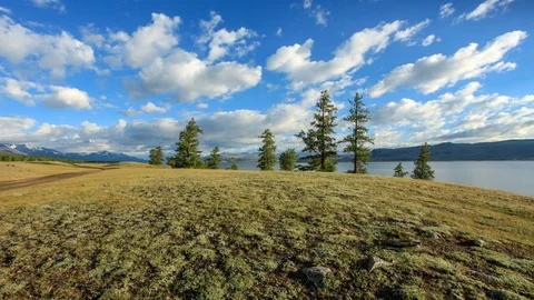 4K. Movement of the clouds over the lake Khoton Nuur, Mongolia. Ultra HD, 4.. Stock Footage 73979803