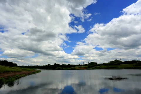 4K. Movement of clouds over the reservoir. Donetsk, Ukraine, Ultra HD Stock Footage 40178652