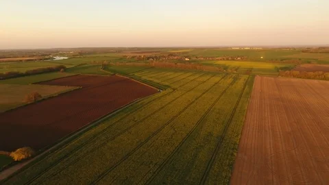 4k moving drone shot of a british series of farmers fields, summer scene Stock Footage 90795964
