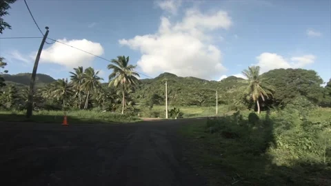 4k moving forward walking view at a backroad in tropical Pacific Cook Islands  Stock Footage 233671874
