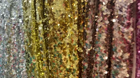 4k Multicoloured shiny fabric in a textile shop. Sequin fabric. Video stock 160604261