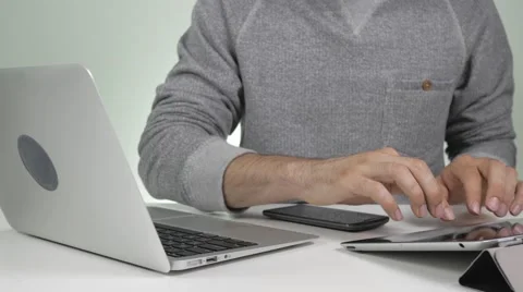 4K Multitasking Using Smartphone, Tablet and Laptop Computer In the Same Time Video stock 65167362
