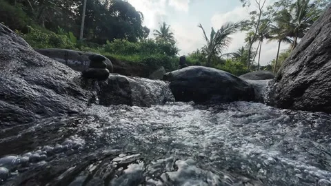 4K Natural River Rapids Flowing Through Rocks in Green Forest Stock Footage 336749797