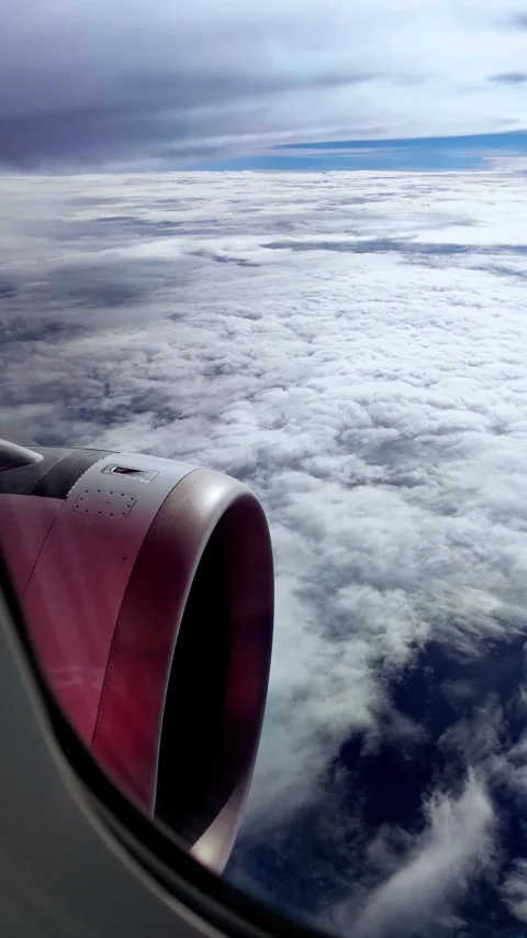 4k nature of clouds, View from an airplane window. Travel concept Stock Footage 258816879