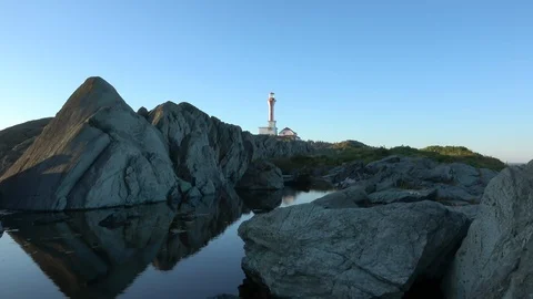 4K Nature Lighthouse Rock Pool Sunset Vídeos de archivo 118309977