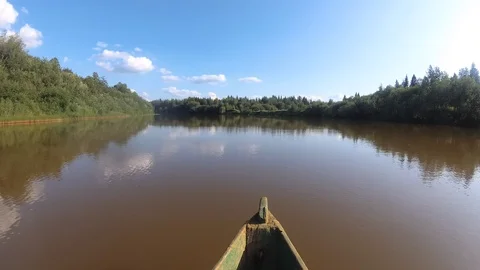 4K nature view from a boat floating on the river Stock Footage 113180743