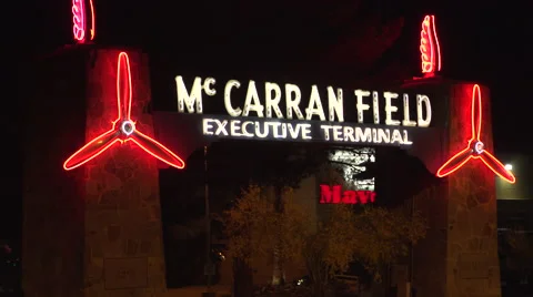 4K: Neon Lights Mark The McCarran Field Executive Terminal Stock Footage 63097254