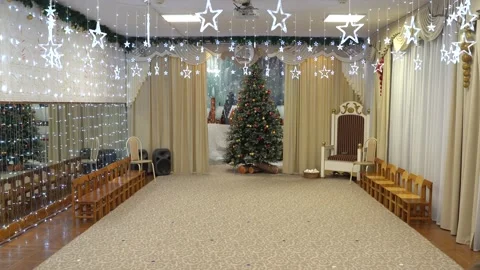 4K. New Year's interior with gift boxes under the Christmas tree. Stock Footage 229839299