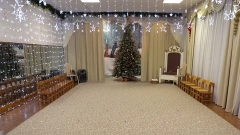 4K. New Year's interior with gift boxes under the Christmas tree. Stock Footage 229839338