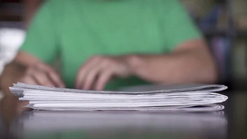 4K NEWSPAPER READING Stock Footage 81407986