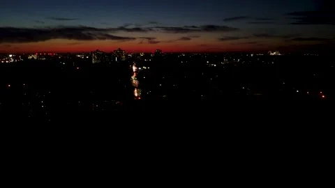 4K Night Aerial Drone Hover-Pan Reveal Skyline from Kissena Park, Queens, NYC Stock Footage 165092380