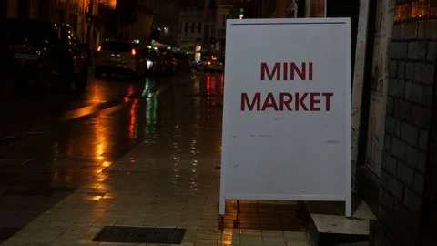 4k night static shot of a line of taxis  and a mini market sign. Stock Footage 123048063