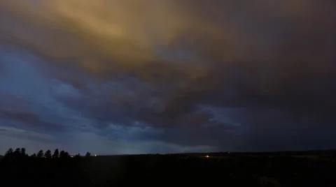 4K Night Time Lapse of Moon In and Out of Clouds Stock Footage 54715003