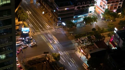 4K Night traffic time lapse at an intersection in downtown Bangkok, Thailand Stock Footage 67435798