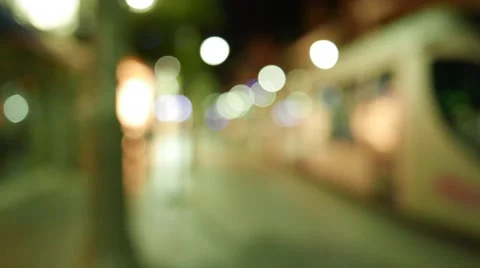 4K Night Train Passing Through Shopping Area Stock Footage 51500197