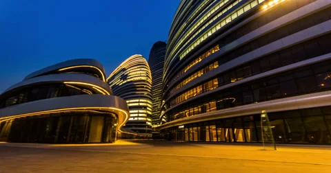 4K-The night view of new-built Wangjing SOHO plaza with some people Stock-Footage 37832302