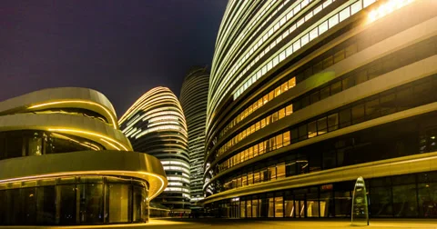 4K-The night view of new-built Wangjing SOHO plaza with some people Stock Footage 37833630