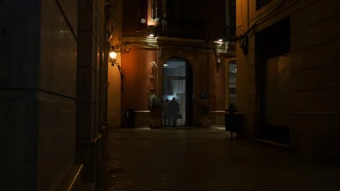 4k night wide angle static shot of the entrance of a luxury boutique hotel Stock Footage 123542176