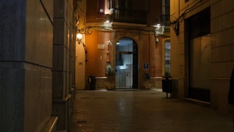 4k night wide angle static shot of the entrance of a luxury boutique hotel Stock Footage 123569476