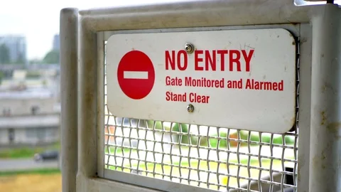 4K No Entry Gate Sign Barrier, Stop Trespassing Door Message Stock Footage 80106614